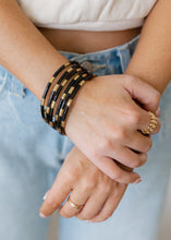 Load image into Gallery viewer, BuDha Girl Veda Black &amp; Gold Bangles
