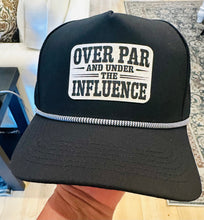 Load image into Gallery viewer, Over Par and Under The Influence Golf ball textered leather hat patch on Black Performance Rope Hat
