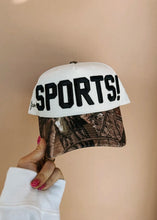 Load image into Gallery viewer, "SPORTS!" Camo Trucker Hat
