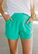 Load image into Gallery viewer, Mono B Athleisure Green Curved Hem Shorts
